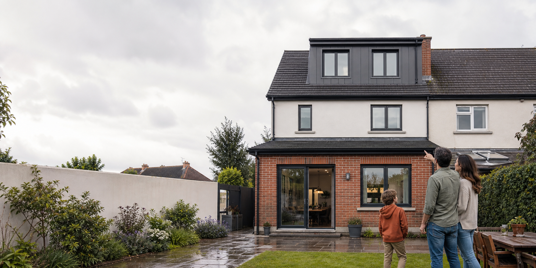 Family looking at a modern rear dormer conversion